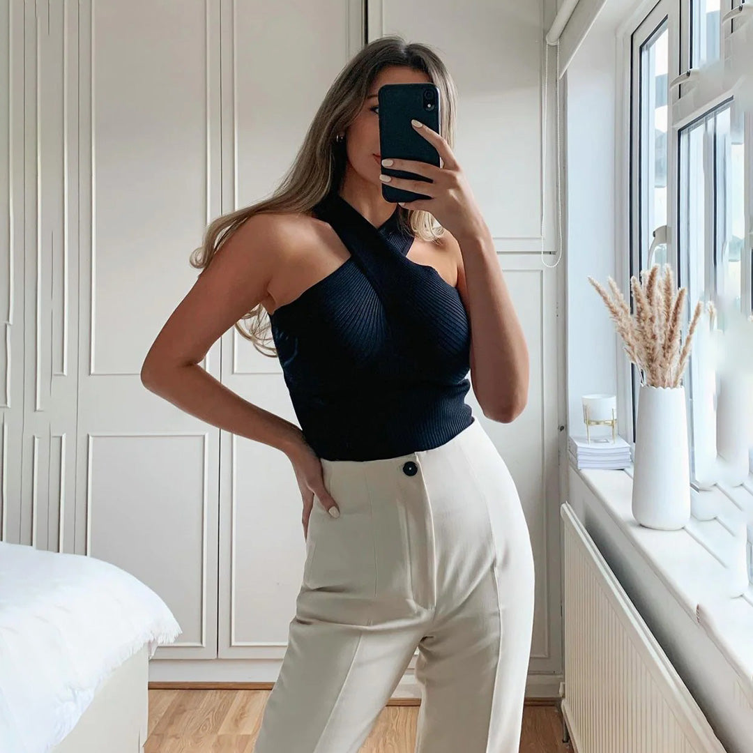Stylish WAVERLY top with subtle criss-crossing straps for an elegant chic look