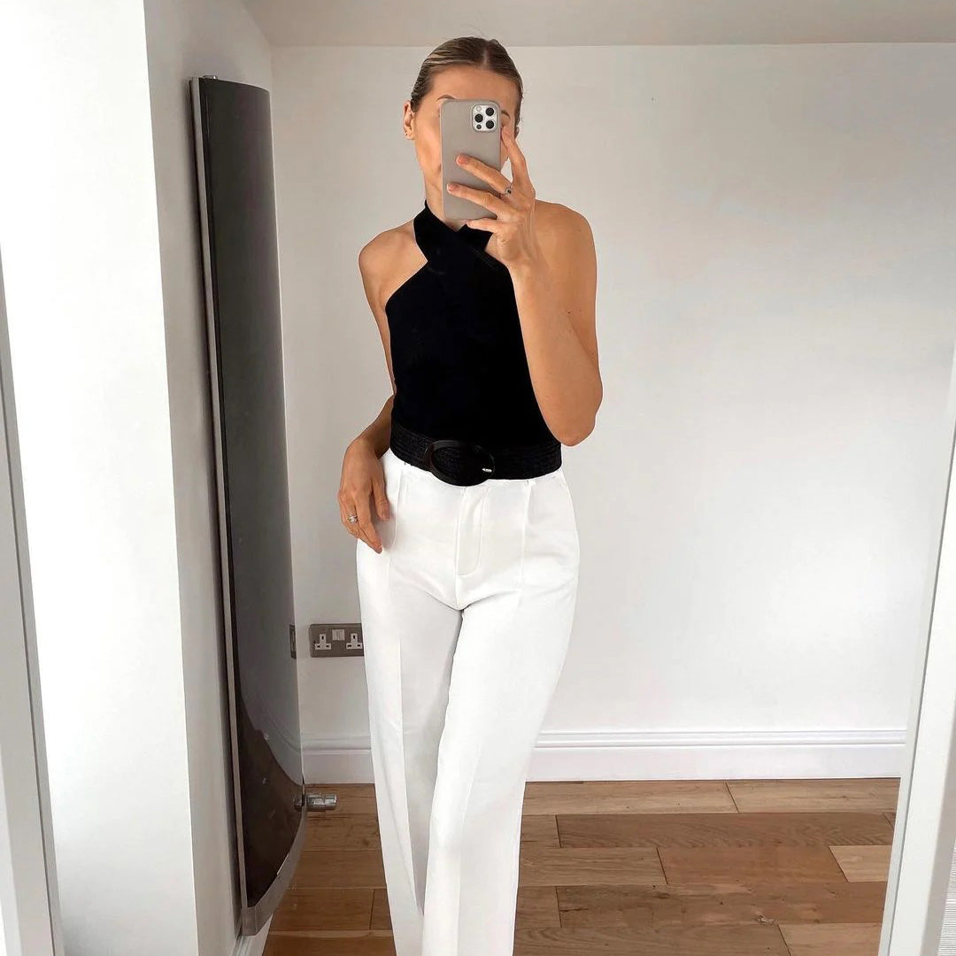 Stylish WAVERLY top with subtle criss-crossing straps for an elegant chic look