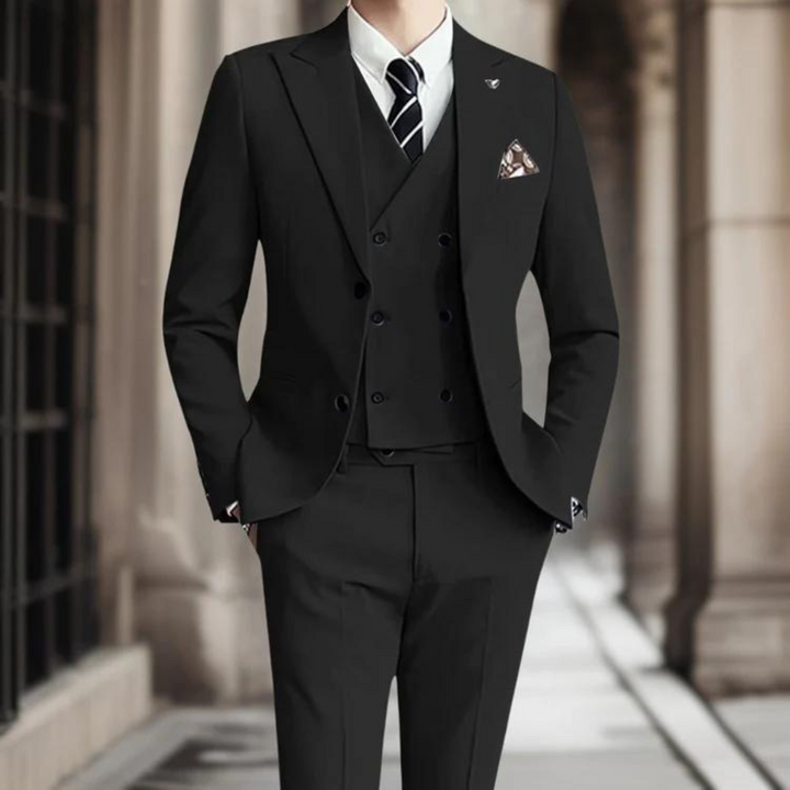 Patrik's elegant three-piece suit provides a sophisticated look