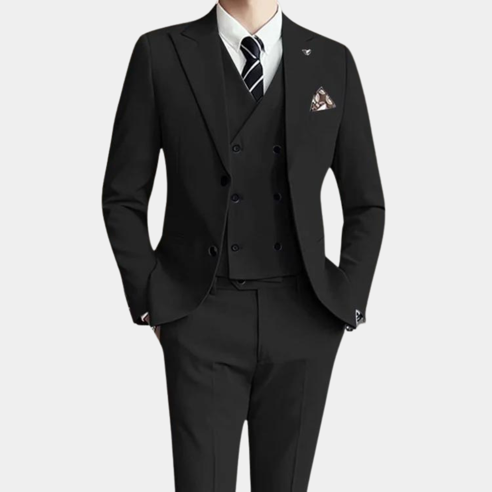 Patrik's elegant three-piece suit provides a sophisticated look