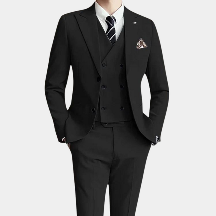 Patrik's elegant three-piece suit provides a sophisticated look