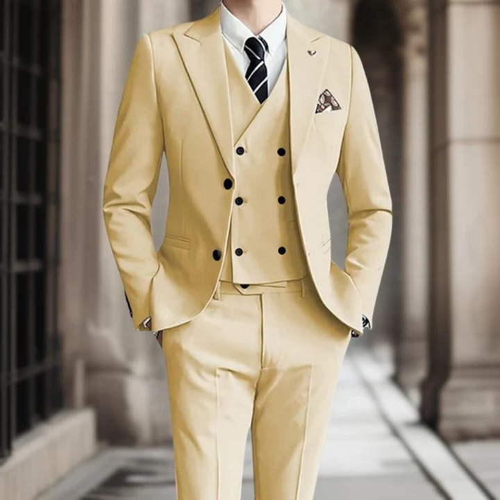 Patrik's elegant three-piece suit provides a sophisticated look